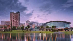 Photo of the Adelaide CBD skyline at dusk, including Intercontinental Hotel, Adelaide Convention Centre and the River Torrens